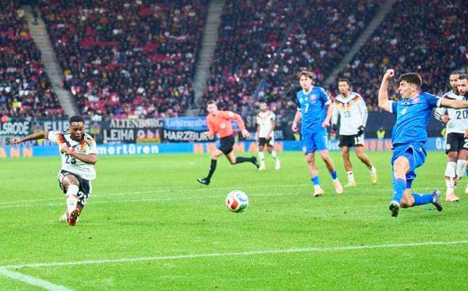 Ridle Baku of Germany scores, shoots goal , Tor, Treffer, Torschuss, 5-0 in the FIFA World Cup, WM, Weltmeisterschaft, Fussball 2026 qualifier match GERMANY - SLOVAKIA in Season 2025 2026 at November 17, 2025 in Leipzig, Germany.