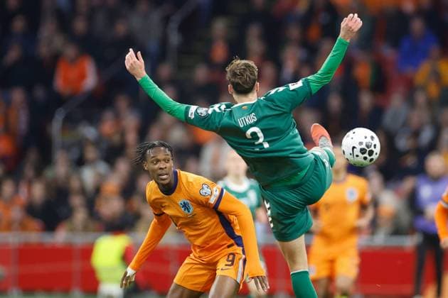 Emmanuel Emegha of the Netherlands, Edgaras Utkus of Lithuania Netherlands v Lithuania, FIFA World Cup, WM, Weltmeisterschaft, Fussball 2026 Qualifier, Netherlands v Lithuania, Johan Cruijff Arena, November 17, 2025, Amsterdam, Netherlands.