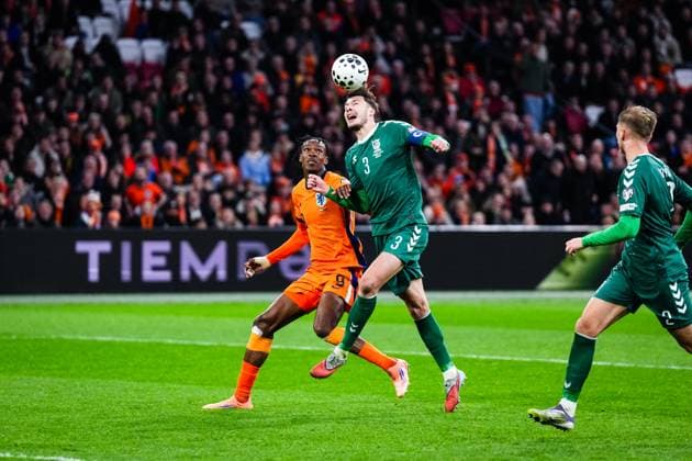 World Cup qualification: The Netherlands v Lithuania Amsterdam - Emmanuel Emegha of The Netherlands, Edgaras Utkus of Lithuania during the qualification match for the World Cup 2026. The match is set between The Netherlands and Lithuania at Johan Cruyff Arena on 17 November 2025 in Amsterdam, The Netherlands. (VK Sportphoto Yannick Verhoeven) Copyright: xYannickxVerhoevenx