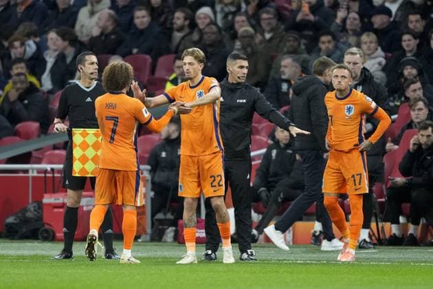 AMSTERDAM, 17-11-2025, Johan Cruijff ArenA , season 2025 2026 , FIFA World Cup, WM, Weltmeisterschaft, Fussball Qualifier football , match between The Netherlands and Lithuania. Pictures shows Netherlands player Xavi Simons, Netherlands player Luciano Valente, Netherlands player Noa Lang Netherlands - Lithuania x32077314x Copyright: