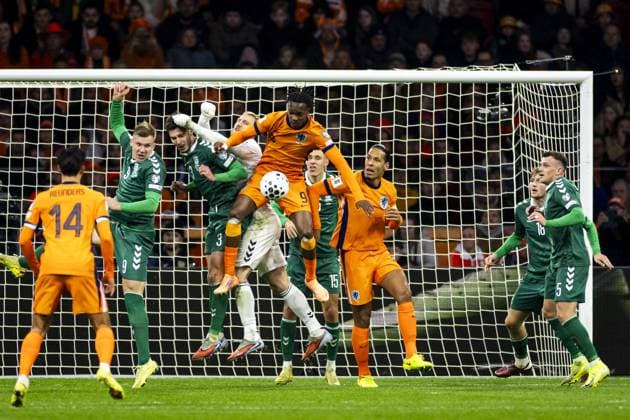 AMSTERDAM - Gytis Paulauskas of Lithuania, Edgaras Utkus of Lithuania, Lithuania goalkeeper Edvinas Gertmonas, Emmanuel Emegha of the Netherlands during the World Cup qualifying match between the Netherlands and Lithuania at the Johan Cruijff ArenA on November 17, 2025, in Amsterdam, Netherlands. ANP KOEN VAN WEEL FIFA 2026 World Cup Qualifier 2025-2026 xVIxANPxSportx xxANPxIVx 542373529 originalFilename: 542373529.jpg