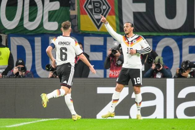 Soccer, World Cup qualification, 20251117, Germany Slovakia In the picture Goal 3 0, Goal celebration, f l Joshua KIMMICH Germany, 6 , Leroy SANE Germany, 19 Leipzig Red Bull Arena Saxony Germany Copyright: Passion2Press MarkusxFischerx