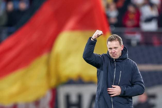 17 11 2025, Football, International match, World Cup Qualification Europe, Germany Slovakia, Red Bull Arena Leipzig , Matchday 10, Season 2025 2026 Final cheer after the 6 0 victory National coach Julian Nagelsmann GER hc stands on the pitch gesticulating and cheering and raising his fist upwards Regulations prohibit any use of photographs as image sequences and or quasi video Sachsen Deutschland