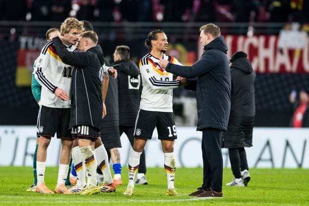 FIFA World Cup UEFA Qualifiers Germany Slovakia 17 11 2025 Leroy Sane Germany, 19 and Julian Nagelsmann national coach Germany embrace after the victory FIFA World Cup UEFA Qualifiers Germany Slovakia Leipzig, Red Bull Arena, 17 11 2025 Copyright: xBEAUTIFULxSPORTS Wunderlx