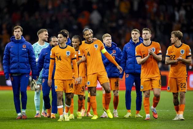 AMSTERDAM (l-r) Tijjani Reijnders of the Netherlands, Nathan Ake of the Netherlands, Virgil van Dijk of the Netherlands, Jerdy Schouten of the Netherlands after the World Cup qualifying match between the Netherlands and Lithuania at the Johan Cruijff ArenA on November 17, 2025, in Amsterdam, Netherlands. ANP KOEN VAN WEEL FIFA 2026 World Cup Qualifier 2025-2026 xVIxANPxSportx xxANPxIVx 542375366 originalFilename: 542375366.jpg