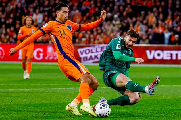 Tijjani Reijnders of the Netherlands shoots under pressure from Edgaras Utkus of Lithuania and scores the 1-0 Netherlands v Lithuania, FIFA World Cup, WM, Weltmeisterschaft, Fussball 2026 Qualifier, Netherlands v Lithuania, Johan Cruijff Arena, November 17, 2025, Amsterdam, Netherlands.