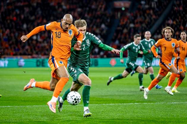 Netherlands forwarder Donyell Malen, Lithuania defender Artemijus Tutyskinas, during the match FOOTBALL EUROPEAN QUALIFIERS NETHERLANDS LITHUANIA at the Johan Cruijff ArenA for the FIFA World Cup 2026 UEFA Qualifiers Group G Matchday 10 season 2025 2026 in AMSTERDAM, Netherlands on 17 november 2025, photo by Stefan Koops EYE4images DeFodi Images