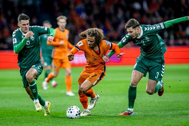 Lithuania midfielder Gvidas Gineitis, Netherlands midfielder Xavi Simons, Lithuania defender Edgaras Utkus, during the match FOOTBALL EUROPEAN QUALIFIERS NETHERLANDS LITHUANIA at the Johan Cruijff ArenA for the FIFA World Cup 2026 UEFA Qualifiers Group G Matchday 10 season 2025 2026 in AMSTERDAM, Netherlands on 17 november 2025, photo by Stefan Koops EYE4images DeFodi Images