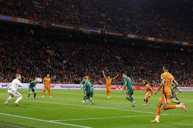 AMSTERDAM - (l-r) Xavi Simons of the Netherlands scores to make it 3-0 and leaves Lithuania goalkeeper Edvinas Gertmonas helpless during the World Cup qualifying match between the Netherlands and Lithuania at the Johan Cruijff ArenA on November 17, 2025 in Amsterdam, Netherlands. ANP MAURICE VAN STEEN FIFA 2026 World Cup Qualifier 2025-2026 xVIxANPxSportx xxANPxIVx 542381106 originalFilename: 542381106.jpg