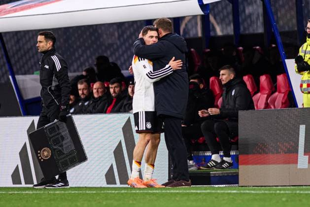 LEIPZIG, GERMANY - 17 NOVEMBER, 2025: Florian Wirtz, Coach, Julian Nagelsmann, substitution - The World Cup 2026 qualifying match Germany vs Slovakia at Red Bull Arena.  Copyright: xVitaliixKliuievx