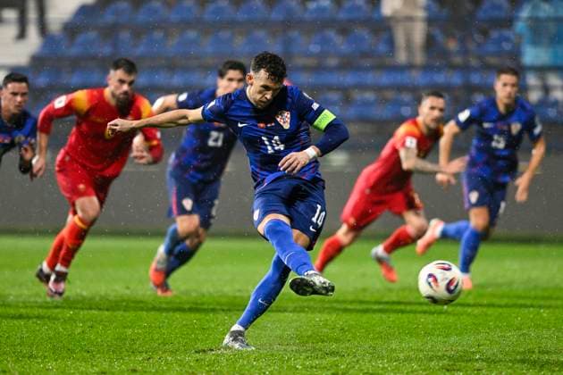 Montenegro v Croatia - FIFA World Cup, WM, Weltmeisterschaft, Fussball 2026 Qualifier PODGORICA, MONTENEGRO - NOVEMBER 17: Ivan Perisic of Croatia scores a goal during the FIFA World Cup 2026 qualifier match between Montenegro and Croatia at Podgorica City Stadium on November 17, 2025 in Podgorica, Montenegro.  StefanxIvanovic PIXSELL