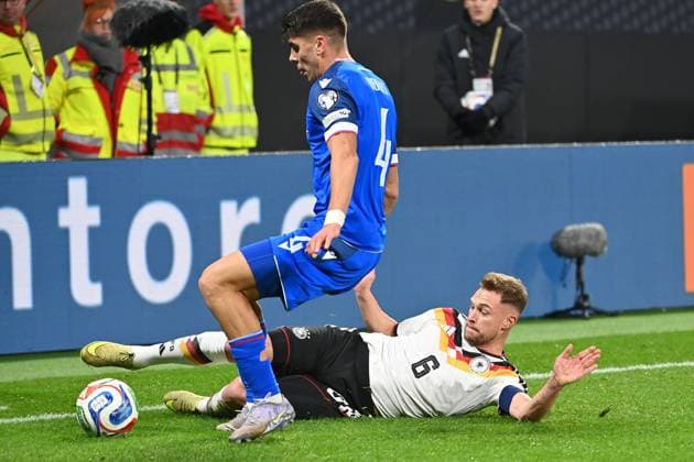 Joshua KIMMICH GER , action,duel against Adam OBERT SVK Soccer international, World Cup Qualification Group A Matchday 06, Germany GER Slovakia SVK on 17 11 2025, RED BULL ARENA Â
