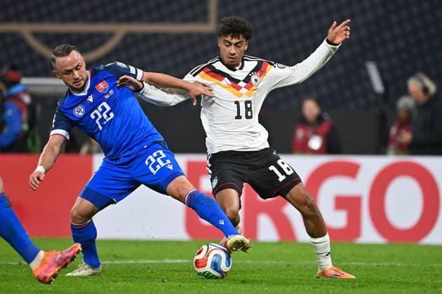 Nathaniel BROWN GER , Action,duel against Stanislav Lobotka SVK Soccer international, World Cup Qualification Group A Matchday 06, Germany GER Slovakia SVK 6 0 on 17 11 2025, RED BULL ARENA
