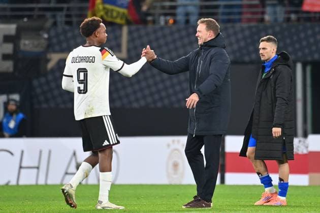 Final cheer from left Assan Ouedraogo GER , national coach Julian NAGELSMANN GER after the end of the match, Soccer international, World Cup Qualification Group A Matchday 06, Germany GER Slovakia SVK 6 0 on 17 11 2025, RED BULL ARENA