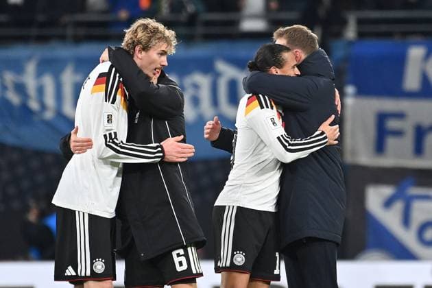 Final celebration from left Nick WOLTEMADE GER ,Joshua KIMMICH GER , Leroy SANE GER , national coach Julian NAGELSMANN GER after the end of the match, Soccer international, World Cup Qualification Group A Matchday 06, Germany GER Slovakia SVK 6 0 on 17 11 2025, RED BULL ARENA