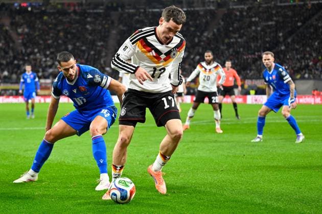 (251118) -- LEIPZIG, Nov. 18, 2025 -- Florian Wirtz (front R) of Germany vies with David Hancko (front L) of Slovakia during the 2026 World Cup European Qualifiers football match between Germany and Slovakia in Leipzig, Germany, Nov. 17, 2025. (Photo by Xinhua) (SP)GERMANY-LEIPZIG-FOOTBALL FIFA World Cup, WM, Weltmeisterschaft, Fussball EUROPEAN QUALIFIERS-GERMANY VS SLOVAKIA UlrichxHufnagel 