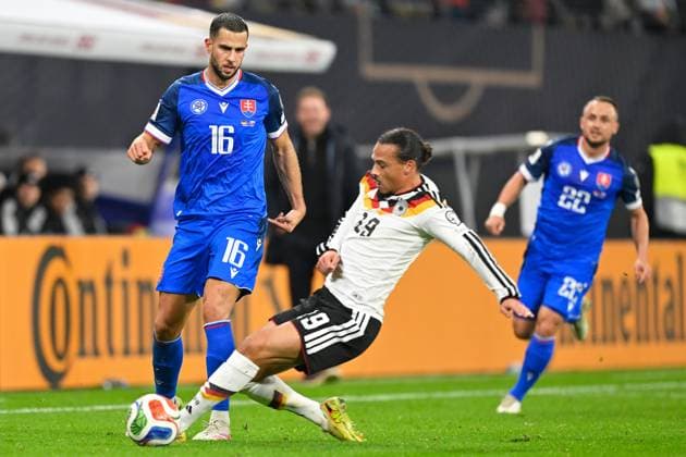 (251118) -- LEIPZIG, Nov. 18, 2025 -- Leroy Sane (C) of Germany vies with David Hancko (L) of Slovakia during the 2026 World Cup European Qualifiers football match between Germany and Slovakia in Leipzig, Germany, Nov. 17, 2025. (Photo by Xinhua) (SP)GERMANY-LEIPZIG-FOOTBALL FIFA World Cup, WM, Weltmeisterschaft, Fussball EUROPEAN QUALIFIERS-GERMANY VS SLOVAKIA UlrichxHufnagel 