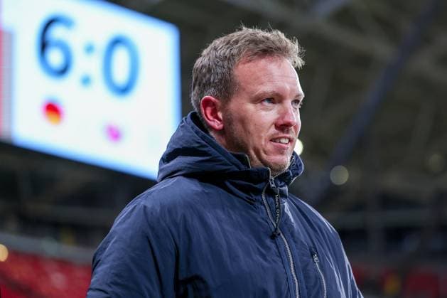 17 11 2025, Football, International match, World Cup Qualification Europe, Germany Slovakia, Red Bull Arena Leipzig , Matchday 10, Season 2025 2026 National coach Julian Nagelsmann GER hc satisfied with the scoreboard showing the 6 0 final score in the background Regulations prohibit any use of photographs as image sequences and or quasi video Sachsen Deutschland