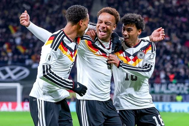 17 11 2025, Football, International match, World Cup Qualification Europe, Germany Slovakia, Red Bull Arena Leipzig , Matchday 10, Season 2025 2026 Goal celebration after the goal to 6 0 by scorer Forzan Assan Ouedraogo GER 09 together with Felix Nmecha GER 13 and Nathaniel Brown GER 18 Regulations prohibit any use of photographs as image sequences and or quasi video Sachsen Deutschland