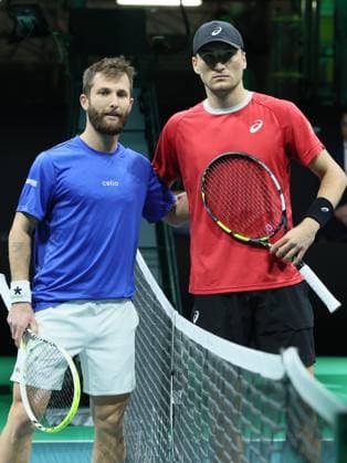 French Corentin Moutet and Belgian Raphael Collignon pose before their tennis match, the first of the Davis Cup quarter-finals Belgium and France, in Bologna, Italy, on Tuesday 18 November 2025. Davis Cup top eight Finals takes place in Bologna from November 18 to 23. BENOITxDOPPAGNE  x142466839x