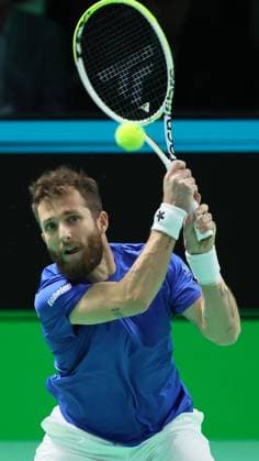 French Corentin Moutet pictured in action during the first game between Belgian Collignon and French Moutet of the Davis Cup quarter- final game between Belgium and France, in Bologna, Italy, on Tuesday 18 November 2025. Davis Cup top eight Finals takes place in Bologna from November 18 to 23. BENOITxDOPPAGNE  x142468135x