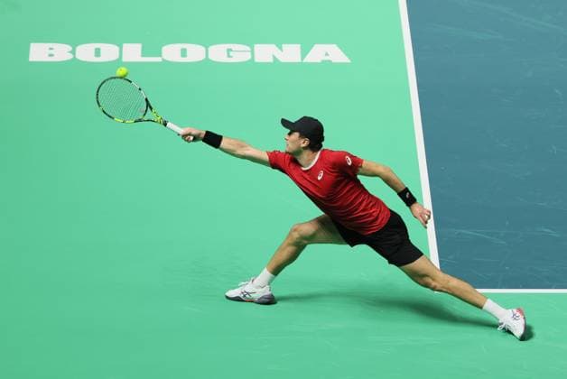 Belgian Raphael Collignon pictured in action during a tennis match against French Moutet, the first match of the Davis Cup quarter-finals Belgium and France, in Bologna, Italy, on Tuesday 18 November 2025. Davis Cup top eight Finals takes place in Bologna from November 18 to 23. BENOITxDOPPAGNE  x142472998x