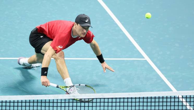 Belgian Raphael Collignon pictured in action during a tennis match against French Moutet, the first match of the Davis Cup quarter-finals Belgium and France, in Bologna, Italy, on Tuesday 18 November 2025. Davis Cup top eight Finals takes place in Bologna from November 18 to 23. BENOITxDOPPAGNE  x142476210x