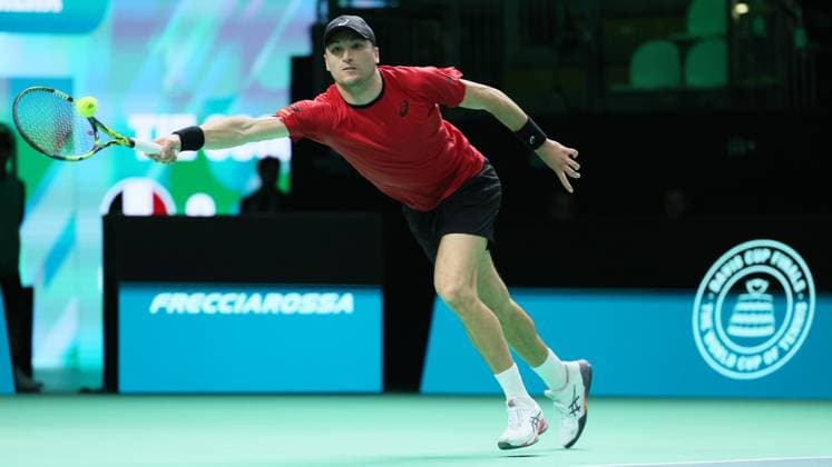 Belgian Raphael Collignon pictured in action during a tennis match against French Moutet, the first match of the Davis Cup quarter-finals Belgium and France, in Bologna, Italy, on Tuesday 18 November 2025. Davis Cup top eight Finals takes place in Bologna from November 18 to 23. BENOITxDOPPAGNE  x142483826x