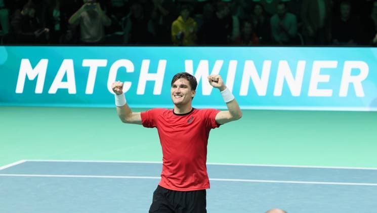 Belgian Raphael Collignon celebrates after winning a tennis match against French Moutet, the first match of the Davis Cup quarter-finals Belgium and France, in Bologna, Italy, on Tuesday 18 November 2025. Davis Cup top eight Finals takes place in Bologna from November 18 to 23. BENOITxDOPPAGNE  x142496118x