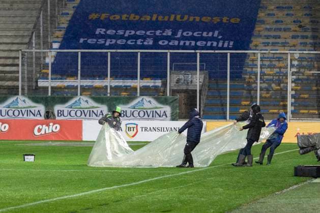 November 18, 2025, FIFA World Cup, WM, Weltmeisterschaft, Fussball Qualifier, Qualifying round, Matchday 10, Group H, Romania vs San Marino,Stadionul Ilie Oana, Ploiesti, Romania Workers protect the pich with plastic sheet befor the start of the game.