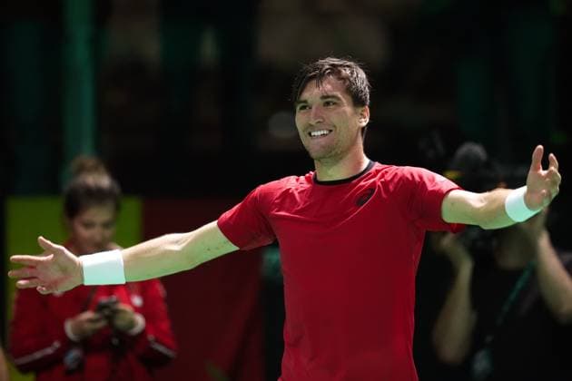 Raphael Collignon celebrates for the victory at the end of the Davis Cup Finals 2025 Quarterfinals match between Corentin Moutet (France) and Raphael Collignon (Belgium) at Bologna Fiere, Bologna, Italy - November 18, 2025. - Tennis.  Copyright: xMassimoxPaolone LaPressex