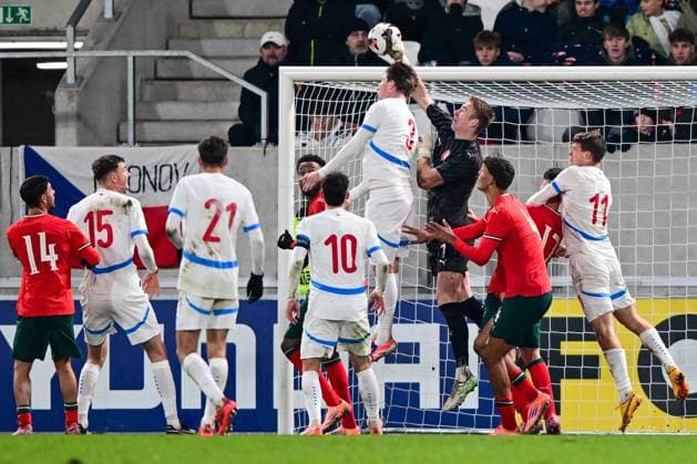 Adam Sevinsky of Brno, in a jump left, and goalkeeper Jan Koutny of Czech Republic in action during the European Championship, EM, Europameisterschaft 2027 U21, U 21 Group B qualification match Czech Republic vs Portugal in Hradec Kralove, Czech Republic, November 18, 2025. (CTKxPhoto DavidxTanecek) CTKPhotoP2025111807045  CTKPhotoP2025111807045