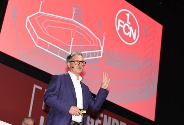 18 11 2025 Soccer Season 2025 2026 2 Soccer Bundesliga General Meeting Annual General Meeting JHV 2025 Sportfoto Zink DaMa xdaxmax Stefan Heim Chief Financial Officer for Accounting Controlling and Financial Accounting 1 FC Nürnberg FCN speaks to Clubfan Clubfans FCN Fans Fans Members speaks about the new stadium