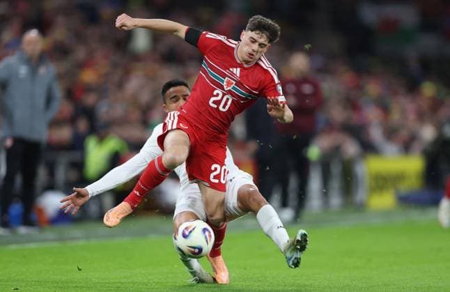 Daniel James of Wales is fouled by Tihomir Kostadinov of North Macedonia Wales v North Macedonia, FIFA 2026 World Cup Qualifying, Group J, Football, Cardiff City Stadium, Cardiff, Wales, UK - 18 Nov 2025Cardiff Cardiff City Stadium United Kingdom EDITORIAL USE ONLY No use with unauthorised audio, video, data, fixture lists, club league logos or live services. Online in-match use limited to 120 images, no video emulation. No use in betting, games or single club league player publications. Copyright: xKieranxMcManus Shutterstockx 15848901q