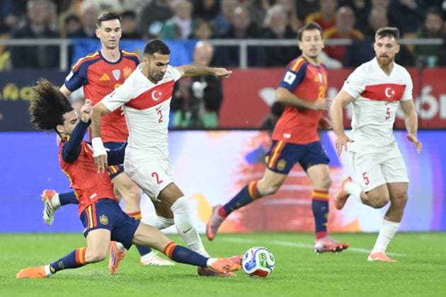 Spain v Turkiye - FIFA World Cup, WM, Weltmeisterschaft, Fussball 2026 Qualifier SEVILLE, SPAIN - NOVEMBER 18: Zeki Celik of Turkiye in action against Marc Cucurella of Spain during the FIFA World Cup 2026 qualifier football match between Spain and Turkiye at Estadio de La Cartuja in Seville, Spain on November 18, 2025. Burak Akbulut Anadolu Seville Spain. Editorial use only. Please get in touch for any other usage.  Copyright: x2025xAnadoluxBurakxAkbulutx