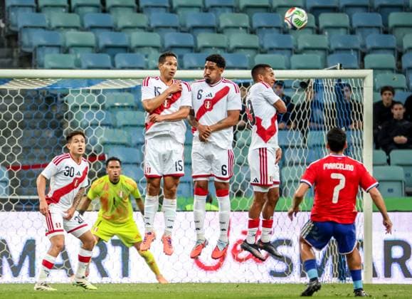 RUSSIA, SOCHI - NOVEMBER 18, 2025: Chile s Marcelino Nunez (R) makes a penalty kick in a friendly football match between the Chilean and the Peruvian men s national football teams at Fisht Stadium. Dmitry Feoktistov TASS  85773832