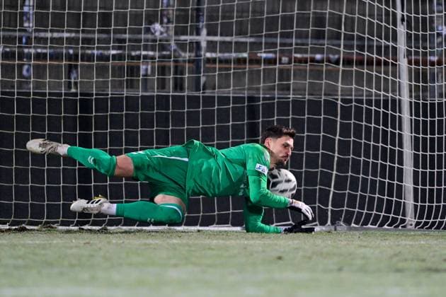 Markus Schoeller goalkeeper, Burghausen, 1 saves Tim Hannemann Unterhachings penalty kick, 18 not pictured, parade, brilliant save, holds the ball, cropped image, single image, action, action, 18 11 2025, Unterhaching Germany , Football, BFV Verbandspokal, quarter-final, SpVgg Unterhaching SV Wacker Burghausen xslx