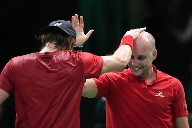 Zizou Bergs celebrates for the victory with captain Steve Darcis at the end of the Davis Cup Finals 2025 Quarterfinals match between Arthur Rinderknech (France) and Zizou Bergs (Belgium) at Bologna Fiere, Bologna, Italy - November 18, 2025. - Tennis.  Copyright: xMassimoxPaolone LaPressex