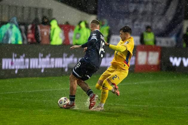 November 18, 2025, FIFA World Cup, WM, Weltmeisterschaft, Fussball Qualifier, Qualifying round, Matchday 10, Group H, Romania vs San Marino,Stadionul Ilie Oana, Ploiesti, Romania 2 Andrei Ratiu ball action in the rain