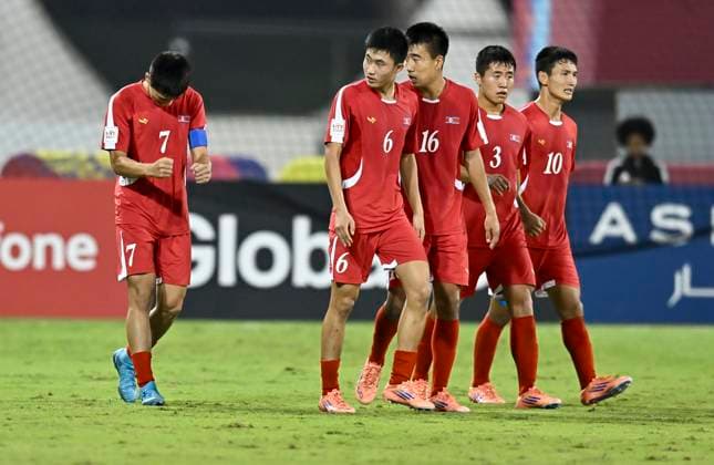 Korea DPR v Japan : Round of 16- FIFA U-17 World Cup Qatar 2025 Hyok Gwang Ri (L) of Korea DPR celebrates after scoring a goal during the FIFA U-17 World Cup Qatar 2025 Round of 16 match between Korea DPR and Japan in Doha, Qatar, on November 18, 2025. DOHA Qatar Copyright: xNOUSHADxTHEKKAYILx