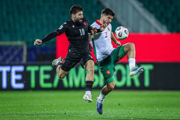 Football - World Cup Qualifiers - Group Stage - Group E - Bulgaria - Georgia - 18.11.2025 Hristiyan Petrov of Bulgaria and Zuriko Davitashvili of Georgia in action during World Cup Qualifiers, Group Stage, Group E between Bulgaria and Georgia Bulgaria Copyright: xYulianxTodorovx