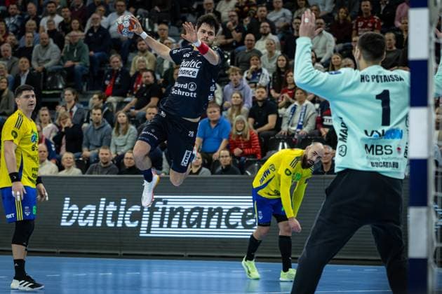 FLENSBURG, GERMANY - NOVEMBER 18: Patrick Volz (SG Flensburg-Handewitt, 28) against Alexandru Florin Bucataru (AHC Potaissa Turda, 01) during the EHF European League match between SG Flensburg-Handewitt vs AHC Potaissa Turda at GP JOULE Arena Flensburg on Matchday 4 of the Group Matches Group A on November 18, 2025 in Flensburg, Germany. Schleswig-Holstein Germany Copyright: xBEAUTIFULxSPORTS MarioxM.xKobergx