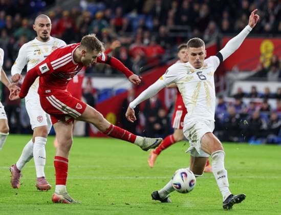 Wales v North Macedonia 2026 FIFA World Cup, WM, Weltmeisterschaft, Fussball Qualifiers Andrej Stojchevski of North Macedonia blocks a shot from David Brooks of Wales during the 2026 FIFA World Cup Qualifiers Group J match at the Cardiff City Stadium, Cardiff UK Newspapers OUT Copyright: xKaraxThomasx FIL-22513-0052