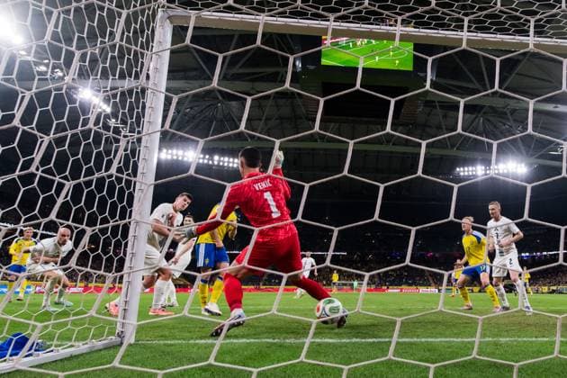 251118 goalkeeper Igor Vekic of Slovenia lets in 1 1 by Gustav Lundgren of Sweden not pictured during the FIFA World Cup Qualifier football match between Sweden and Slovenia on November 18, 2025 in Stockholm Photo Jesper Zerman BILDBYRAN kod JZ JM0752 bbeng fotboll football soccer fotball vm kval fifa world cup qualifier sverige sweden sverige a slovenien slovenia  Copyright: JESPERxZERMAN BB251118JZ081