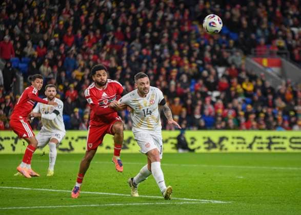 18th November 2025; Cardiff City Stadium, Cardiff, Wales; FIFA World Cup, WM, Weltmeisterschaft, Fussball Qualifying International Football, Wales versus North Macedonia; Jay Dasilva of Wales and Darko Velkovski of North Macedonia tussle for the loose ball  AledxHopkins