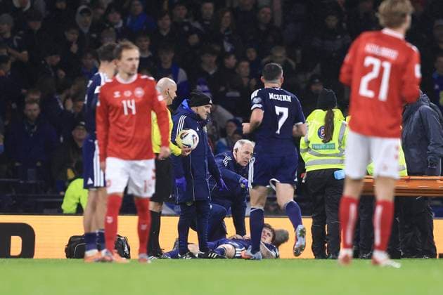 18th November 2025; Hampden Park, Glasgow, Scotland; FIFA World Cup, WM, Weltmeisterschaft, Fussball Qualifiers International Football, Scotland versus Denmark; Ben Gannon-Doak of Scotland receives treatment after being injured  DavidxYoung