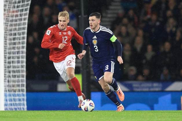 18th November 2025; Hampden Park, Glasgow, Scotland; FIFA World Cup, WM, Weltmeisterschaft, Fussball Qualifiers International Football, Scotland versus Denmark; Andy Robertson of Scotland goes past Victor Froholdt of Denmark  DavidxYoung