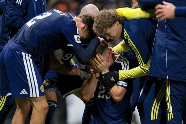 UK: Scotland v Denmark, UEFA World Cup European Qualifiers at Hampden Park, Glasgow, Scotland on 18 November 2025: Pictured: Kenny McLean (Scotland) scores from his own half to make it 4-2 sparking wild celebrations Glasgow Hampden Park Scotland Copyright: xAlexxToddx