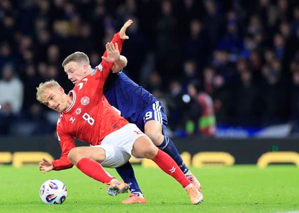 Scotland v Denmark 2026 FIFA World Cup, WM, Weltmeisterschaft, Fussball Qualifiers Gustav Isaksen of Denmark (left) and Lewis Ferguson of Scotland in action during the 2026 FIFA World Cup Qualifiers Group C match at Hampden Park, Glasgow UK Newspapers OUT Copyright: xFredxPalmerx FIL-22515-0142