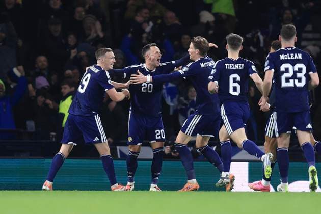 18th November 2025; Hampden Park, Glasgow, Scotland; FIFA World Cup, WM, Weltmeisterschaft, Fussball Qualifiers International Football, Scotland versus Denmark; Lawrence Shankland of Scotland is congratulated after scoring for 2-1 in the 78th minute by Lewis Ferguson and Scott McTominay  DavidxYoung